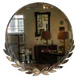 1940's Neoclassical style round mirror.