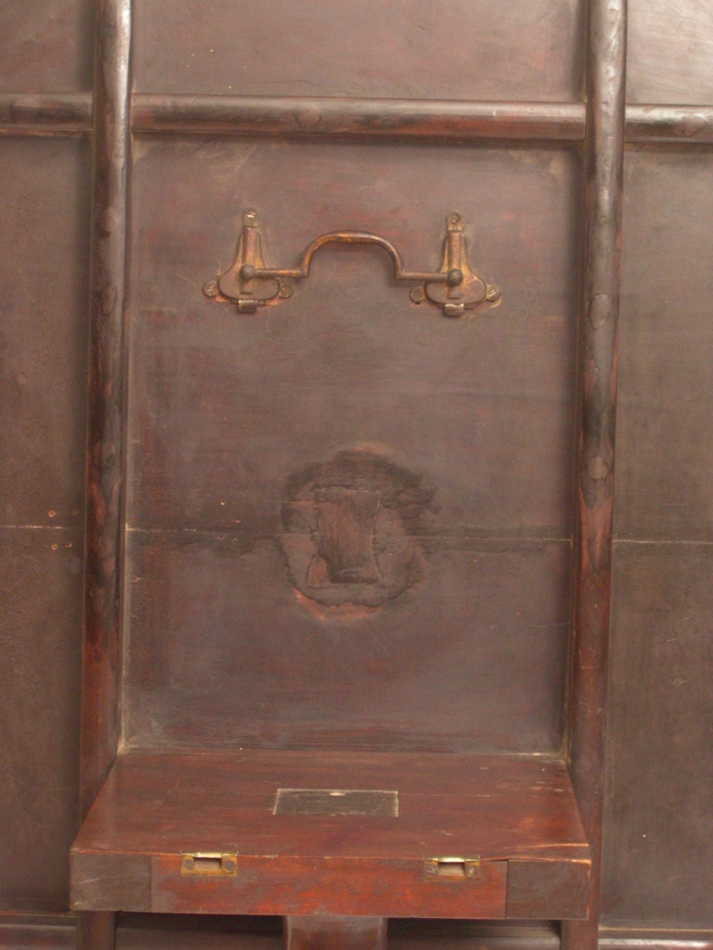 19th Century Regency period tilt top pedestal round table in mahogany.