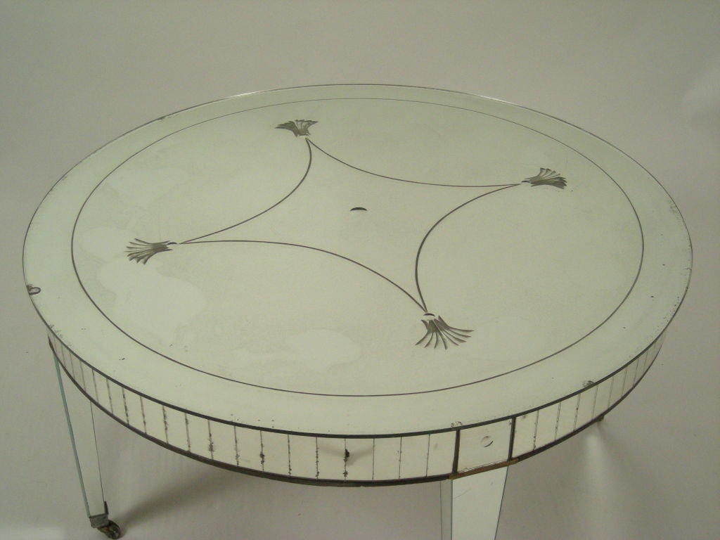 1930s round mirrored cocktail table by Paine Furniture Company, Boston, with etched geometric design on top and panelled sides  Signed.