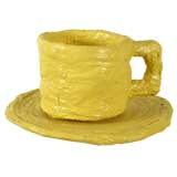 GIANT   ARTIST MADE YELLOW PLASTER TEA CUP AND SAUCER