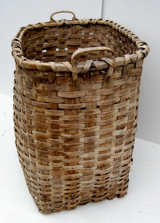 Large-scale woven basket.  Very graphic with worn,weathered patina. <br />
Great hanging or free-standing.