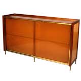 cabinet with amber glass sliding doors