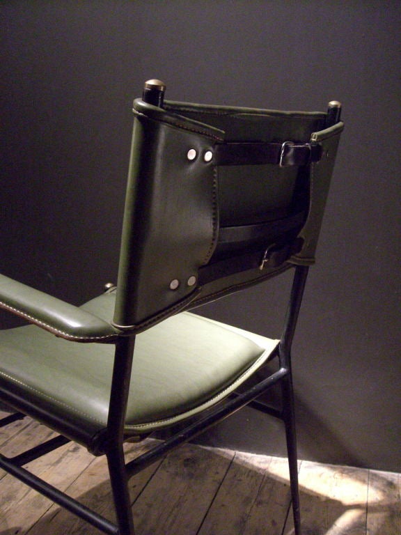 French A green skai armchair by Jacques Adnet