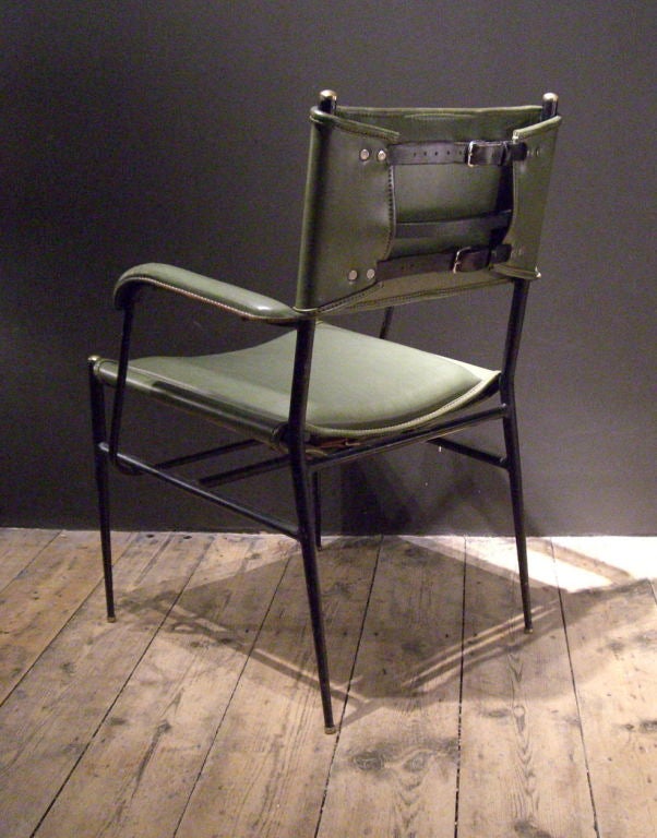 Mid-20th Century A green skai armchair by Jacques Adnet