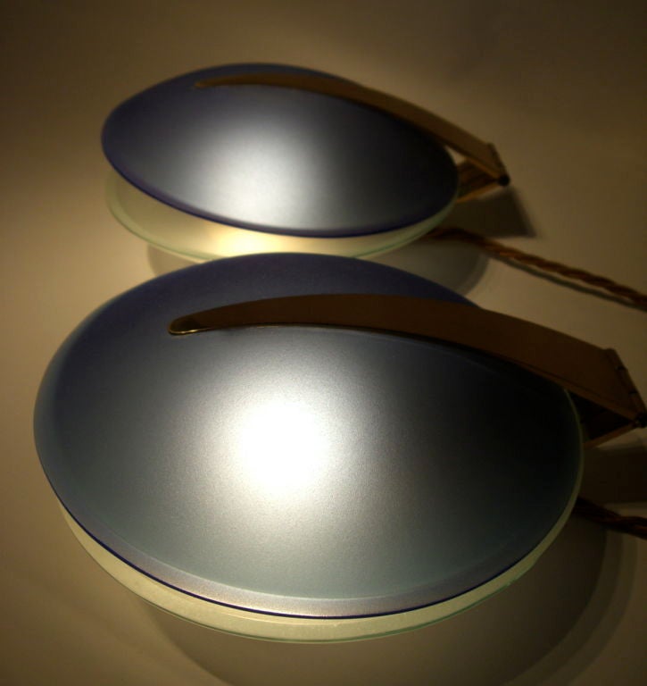 A pair of opaque blue and clear glass 'oyster' lamps<br />
by Max Ingrand, Fontana Arte