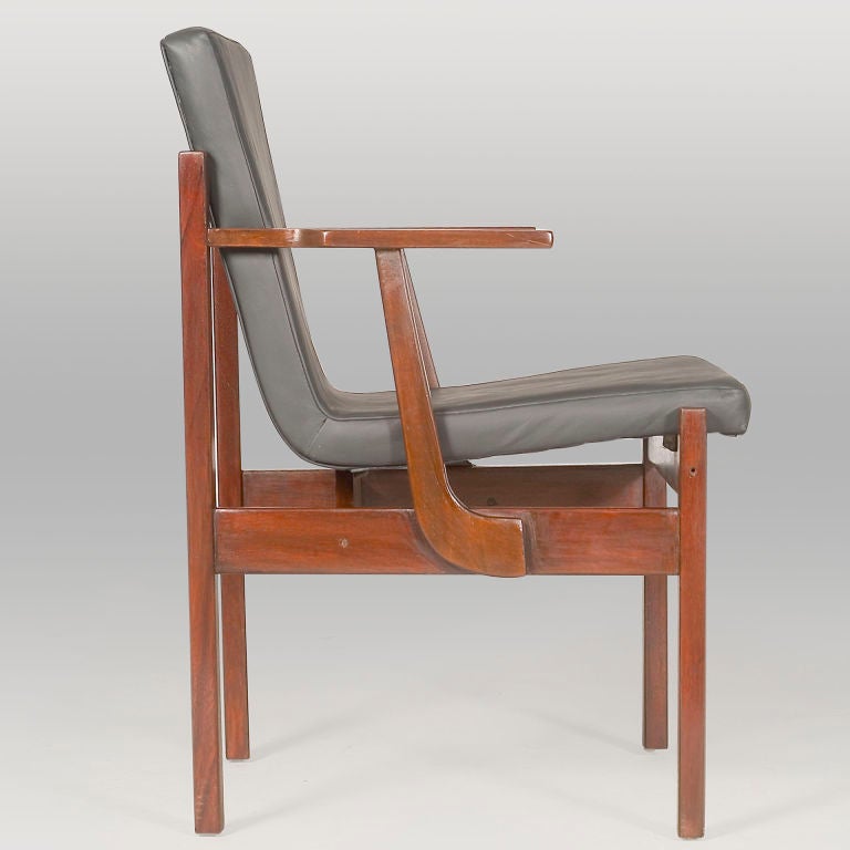 Pair of Jacaranda Rosewood Armchairs with leather upholstery by Michel Arnoult (attributed)