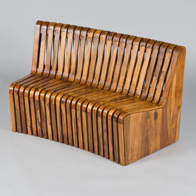 1950's Olivewood Modular Seating and Centre Tables, France.

At Christie's in November 2010, an identical set achieved over $8 300. 

We have a small collection of this modular seating in our restoration workshop that enables us to offer any