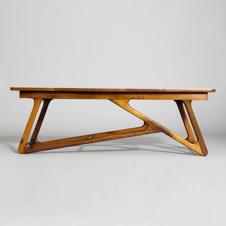 Unusual Honey caviuna centre table, 1952 / 1956, Sao Paulo, Brazil.

The legs are the outstanding feature of this table. The top can be removed and replaced with glass to take full advantage of their design.