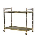 A Lucite and Brass Trimmed Trolley USA 1970s