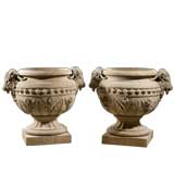 A Pair of Reconstitued Stone Pulham Vases with Goat Heads