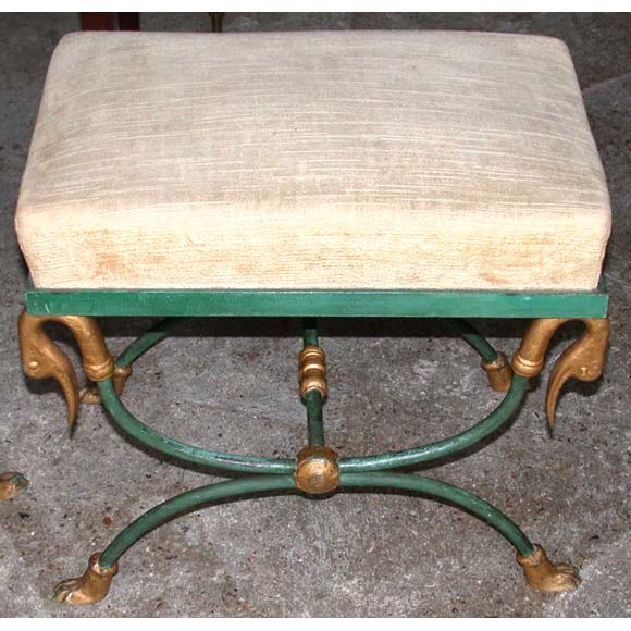Pair of green and gilt patina cast and wrought iron swan head stools.