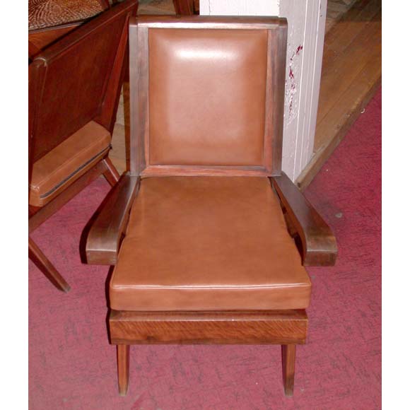 A pair of  rosewood frame chairs with toffee leather backs and removable cushion seats.