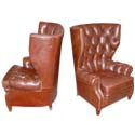 Pair of Large Wing Back Tufted Leather Armchairs Pair of Large Wing Back Tufted Leather Armchairs
