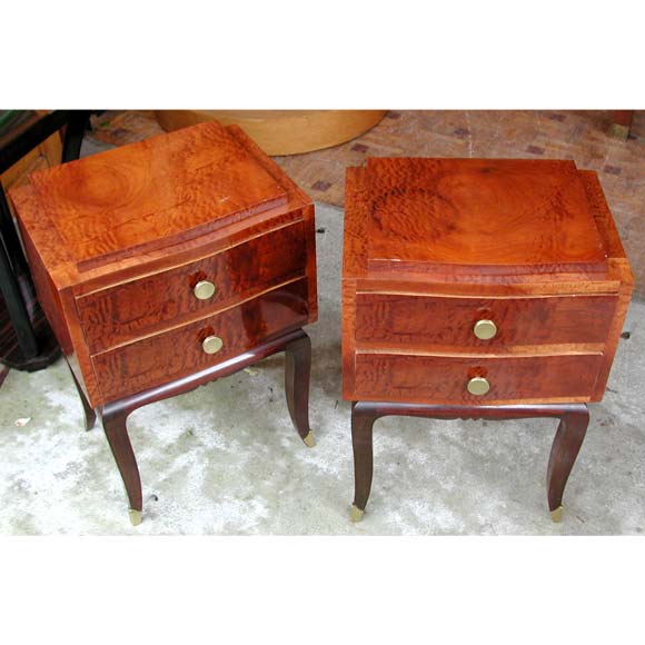 A pair end tables with two drawer veneered burr elm wood top on stained wooden legs finishing in bronze sabots.