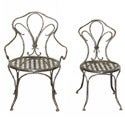Seven Wrought Iron Chairs