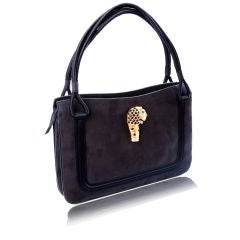 Fine Suede charcoal grey bag with jeweled medallion