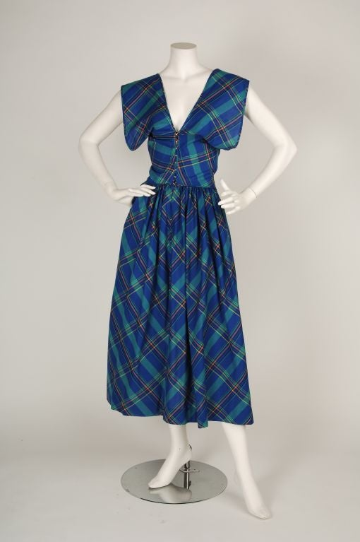 1950’s 3 Piece Play-Suit, Jacket and Dress Circa late 1940/early 1950<br />
Claire McCardell for Townley Romper <br />
Blue plaid madras romper with puffy shorts. Romper is cotton with elastic at waist, leg and top and around side by zipper. The