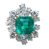 Elegant emerald and diamond ring