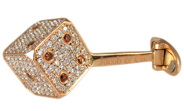These Jacob and Co. pave diamond dice in 18 karat rose gold are absolutely necessary when making that last minute, late night run to Vegas in your jet.  With 7.50 carats of orange and white diamonds, these cufflinks do it to it.