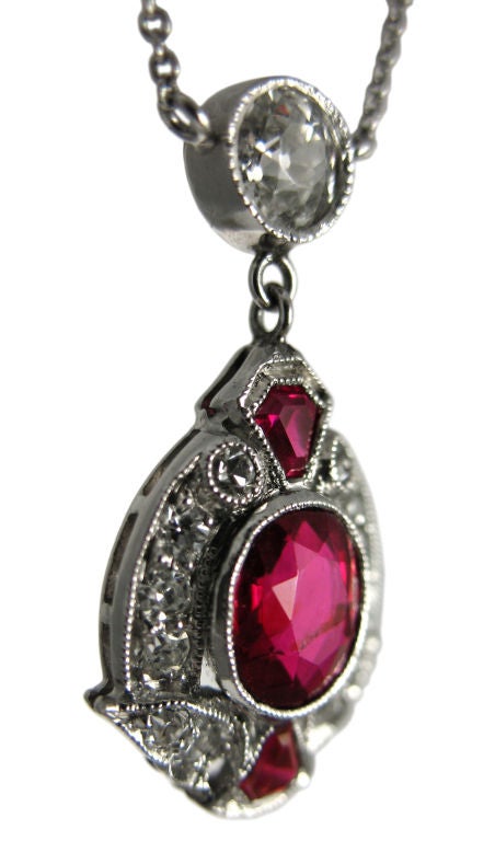 Beautiful ruby and diamond pendant set in platinum and hung from a 0.30ct Old Mine Cut Diamond.