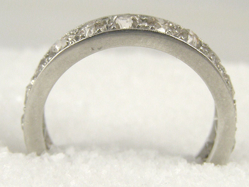 Platinum eternity band 5mm wide with 20 OEC diamonds approx 2.50cts+. Bead set Size 8