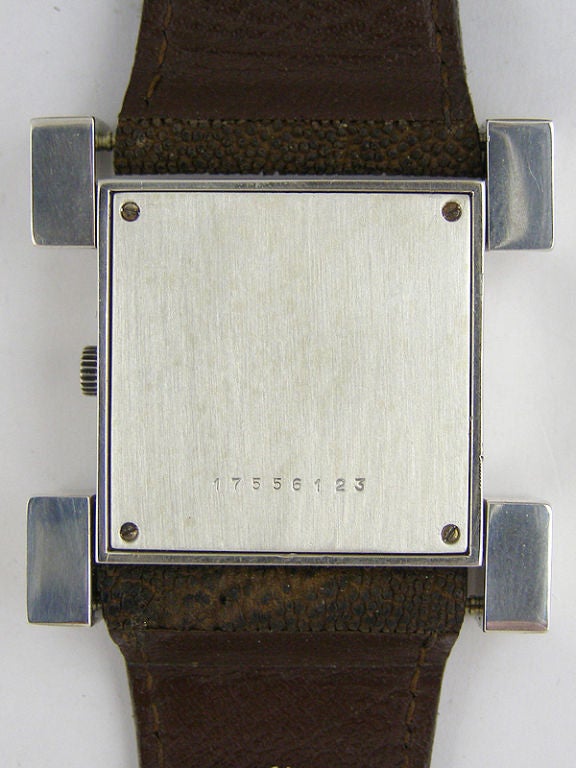 Longines silver Serge Mazon ultra thick square case with massive square hinged lugs circa 1970. Featuring original silvered minimalist dial with cross hairs, original brown elephant skin strap with original squared silver buckle. Electronic, battery