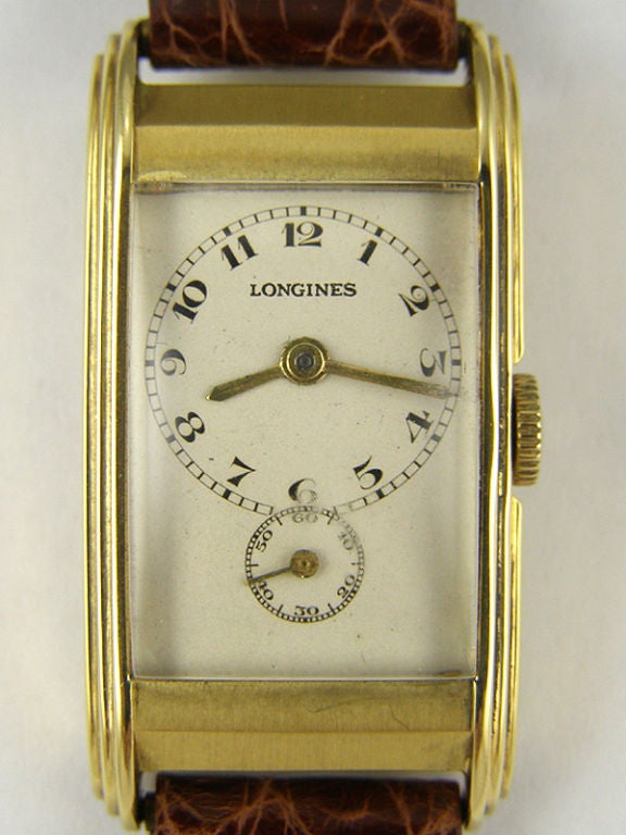 Longines 14K YG duo dial doctor's watch circa 1930's 20 X 38mm case with distinct stepped art deco design case. Watch features matte silver dial with black printed arabic figures. Longines calibre 9.32 17 jewel manual wind movement. Longines