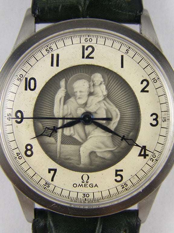 Omega Stainless Steel manual wind model ref 2318/2 with mint original dial featuring rich and detailed, shallow relief image of  St Christopher. Rare large size model 33.5 X 39 mm calatrava style 3 piece case . Beautiful condition original matte