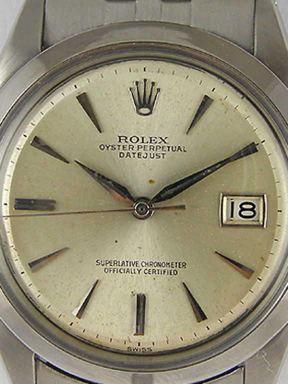 Rolex SS Datejust ref 1603 serial #1.1 million circa 1965. Original matte silver dial, smooth bezel, on fine leather strap. Complete with inner and outer box and Rolex numbered warrantee papers. Great looking model and collector's piece.