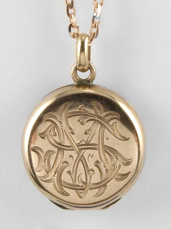 14K pink gold locket with scalloped pattern & old mine cut diamond on 16