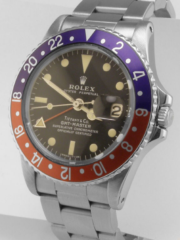 Rolex SS GMT ref # 1675 serial #5.2 million circa 1978 retailed by Tiffany & Co. Original matte black dial with lightly patina'd luminous indexes and matching hands dial signed Tiffany & Co. Red and blue 24 hour so called 