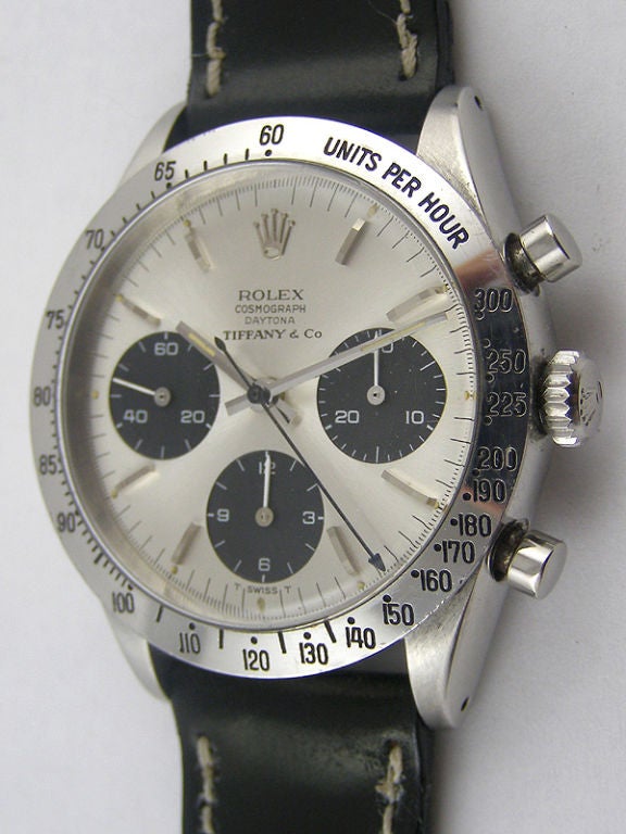 Rolex SS Daytona ref # 6239 serial # 1.4 million with silver dial black registers signed Rolex Cosmograph Daytona Tiffany & Co. 300 mph SS tachometer bezel. Calbire 722 17 jewel manual wind 3 registers chronograph. Very clean all original example.