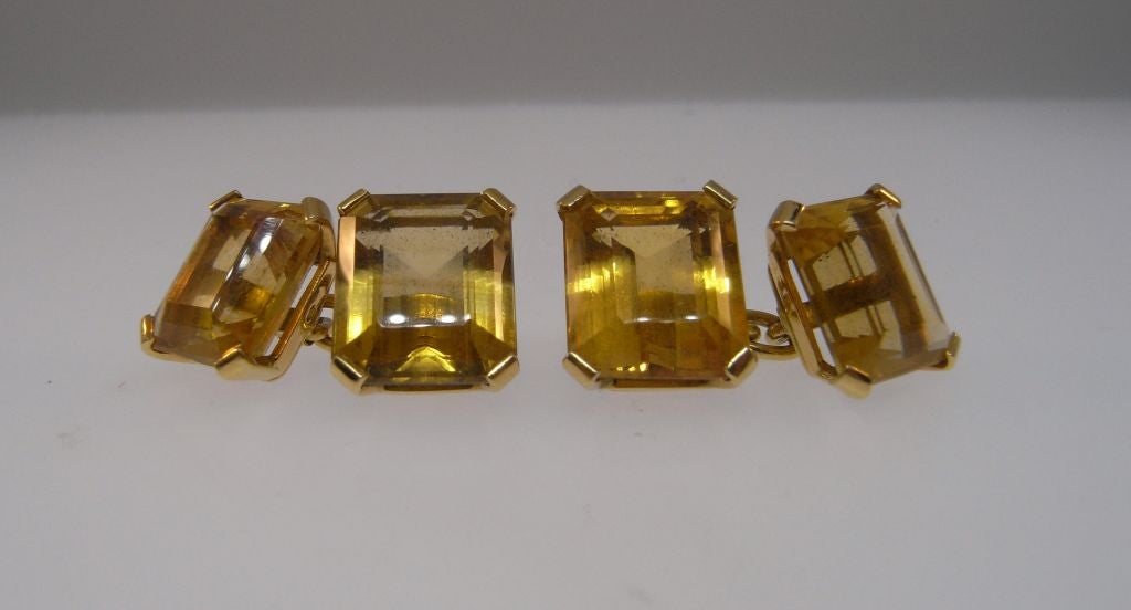A pair of emerald cut citrine and 18kt gold cufflinks by Suzanne Belperron (1900-1983).  The citrines weigh an approximate total of 24 carats.  Belperron trained under Rene Boivin until 1933 when she set up shop for herself in Paris.  Her clients