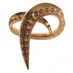 Mellerio gold and ruby drape bracelet