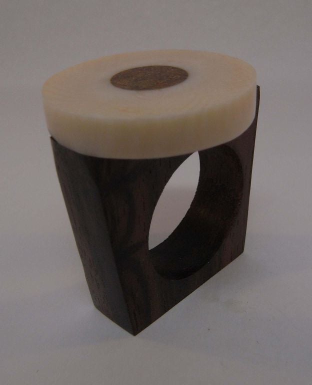 An ivory and wood disc ring by Catherine Noll 1