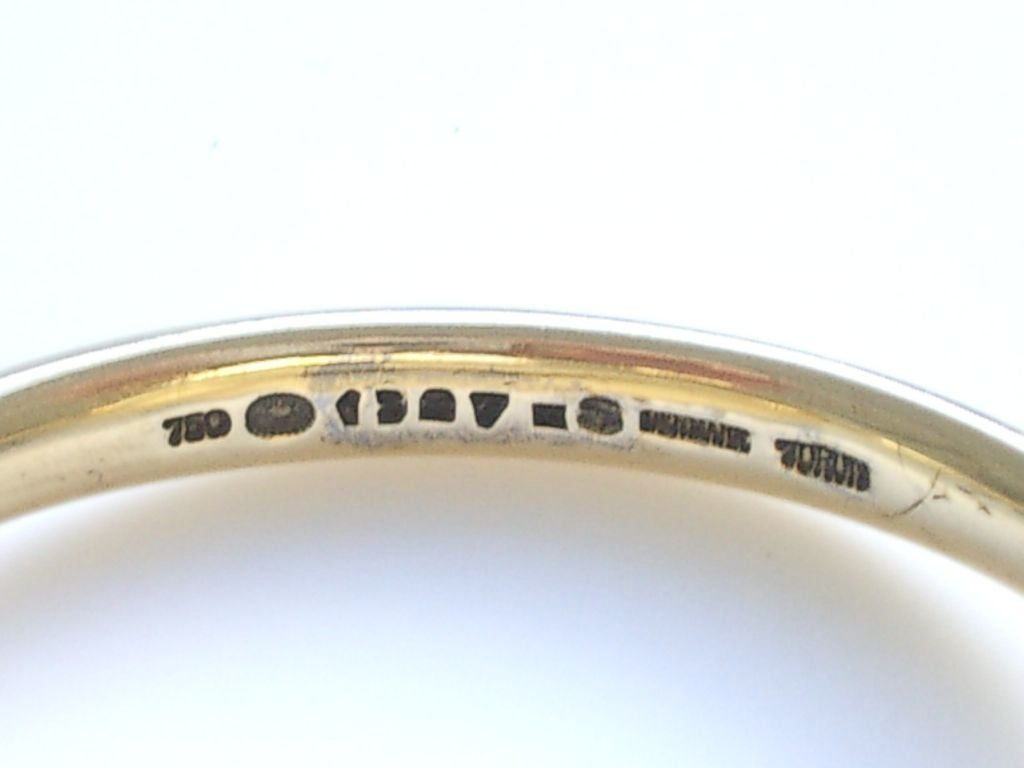 A sleek 18k Yellow gold bracelet watch by Vivianna Torun Bulow-Hube (1927-2004)for Georg Jensen. This vintage 1960's version of the popular Torun watch measures approximately 2