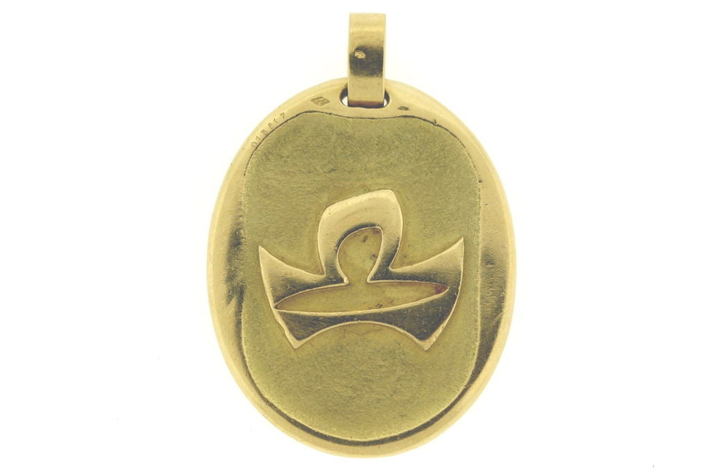 18k gold Libra zodiac pendant, signed Cartier