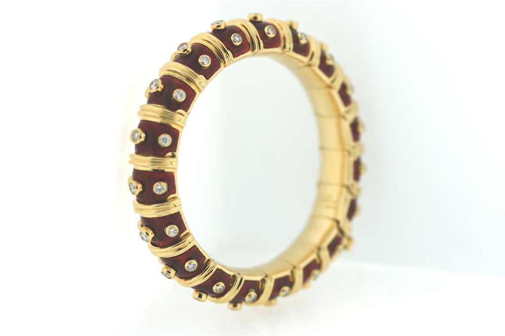 18k gold and diamond enamel articulated bracelet in a scrumptious shade of candy apple red! Looks great on its own or paired with a gold bracelet.