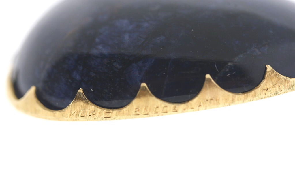 18k gold Gemini zodiac pendant mounted on sodolite stone of a navy blue shade, 1.75