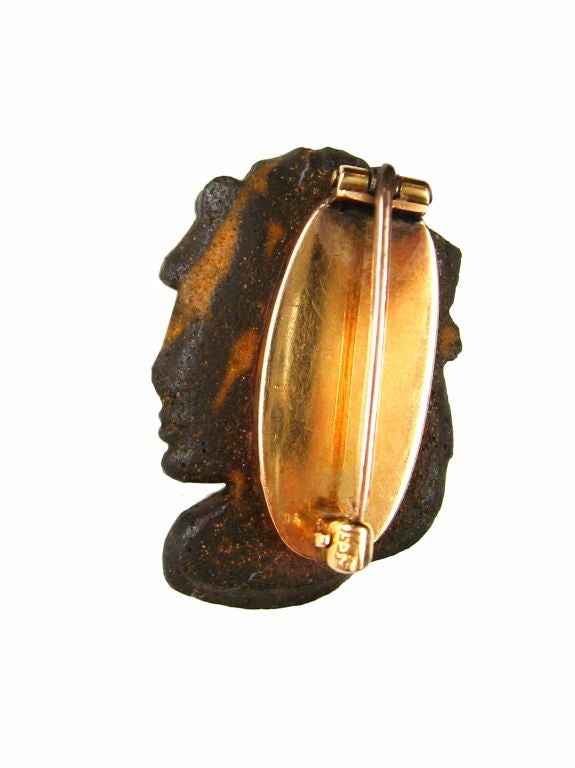 Women's An antique carved opal and gold pin