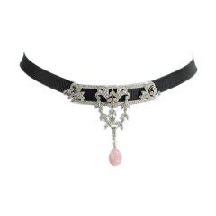 A Belle Epoque diamond and conch pearl choker