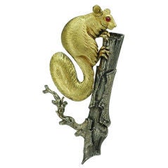A gold and silver bushbaby pin by Buccellati