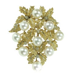 A cultured pearl and gold clip brooch by Buccellati