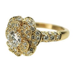 A diamond and gold flower ring by Chanel