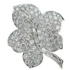 A diamond leaf brooch by Van Cleef & Arpels