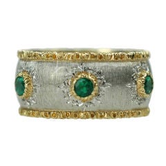 an 18k Gold and Emerald "Capri" Band Ring by Buccellati