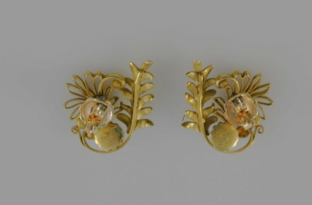 Georg Jensen earrings #53 in 18kt gold and pearl for pierced ears. Designed by Johan Rohde circa 1920's.  Each measures approximately 3/4