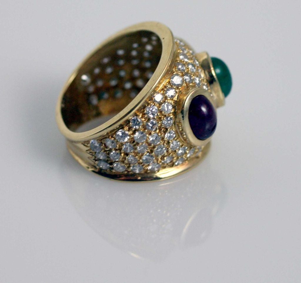 Three stone diamond ring with cabochon ruby, emerald & sapphire