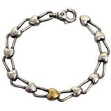 Vintage Tiffany & Co. heart link bracelet in sterling silver & gold