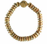 Triple Color Gold Disc Bracelet by Garrard Crown Jewelers